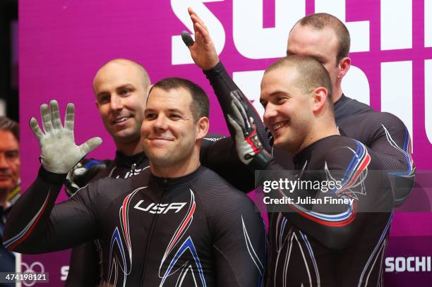 Pilot Nick Cunningham, Justin Olsen, Johnny Quinn and Dallas Robinson of the United States team 2 look on after a run during the Men's Four Man...