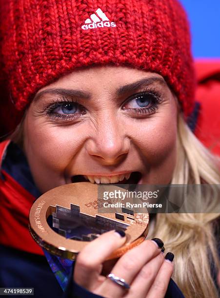 Bronze medalist Anna Sloan of Great Britain celebrates during the medal ceremony for Women's Curling on Day 15 of the Sochi 2014 Winter Olympics at...