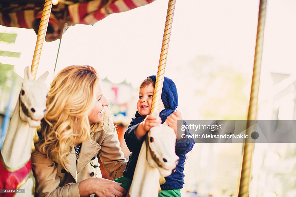 On a carousel ride