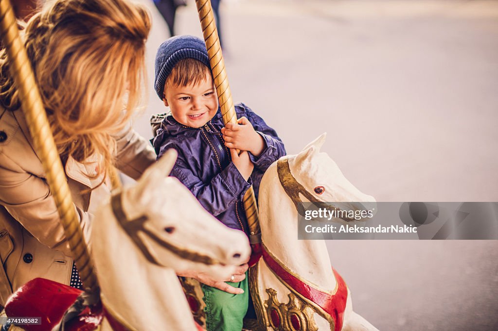 On a carousel ride