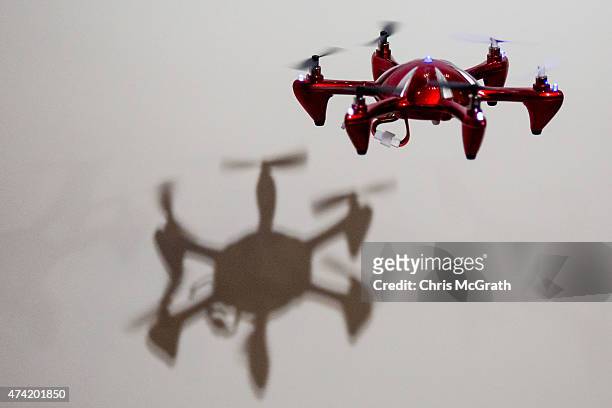 Small drone is seen flying during a demonstration at the International Drone Expo 2015 at Makuhari Messe on May 21, 2015 in Chiba, Japan.
