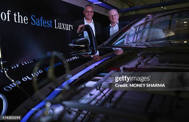 Mercedes-Benz India Managing Director and CEO Eberhard Kern and Head Guard Sales Markus Rubenbauer pose for a photograph during the launch of the...