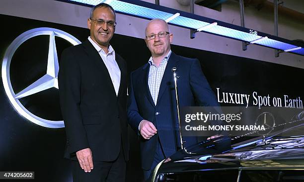 Mercedes-Benz India Managing Director and CEO Eberhard Kern and Head Guard Sales Markus Rubenbauer pose for a photograph during the launch of the...