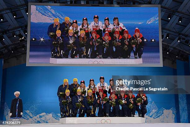 Silver medalists Sweden, gold medalists Canada and bronze medalists Great Britain celebrate during the medal ceremony for Women's Curling on Day 15...