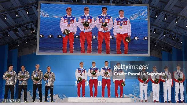 Silver medalists the United States, gold medalists Russia and bronze medalists China celebrate on the podium during the medal ceremony for the Men's...