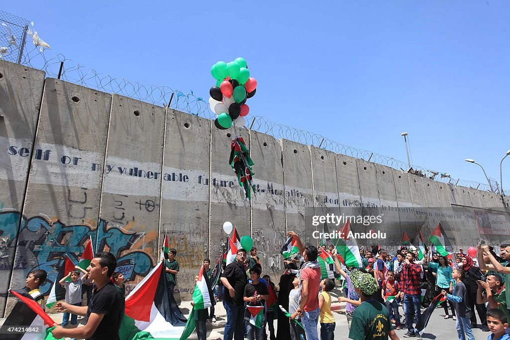 Palestinians protest Israeli separation barrier in Jerusalem
