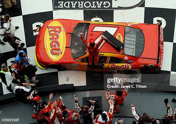 Regan Smith, driver of the Ragu Chevrolet, celebrates in Victory Lane after winning during the NASCAR Nationwide Series DRIVE4COPD 300 at Daytona...