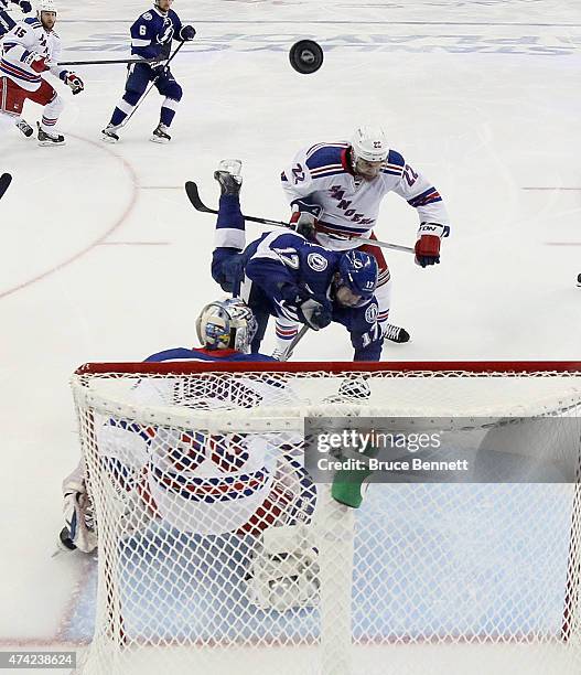Henrik Lundqvist and Dan Boyle of the New York Rangers defend against Alex Killorn of the Tampa Bay Lightning in Game Three of the Eastern Conference...