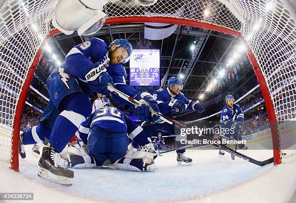 Nikita Nesterov, Ben Bishop, Anton Stralman and Ryan Callahan of the Tampa Bay Lightning defend against the New York Rangers in Game Three of the...