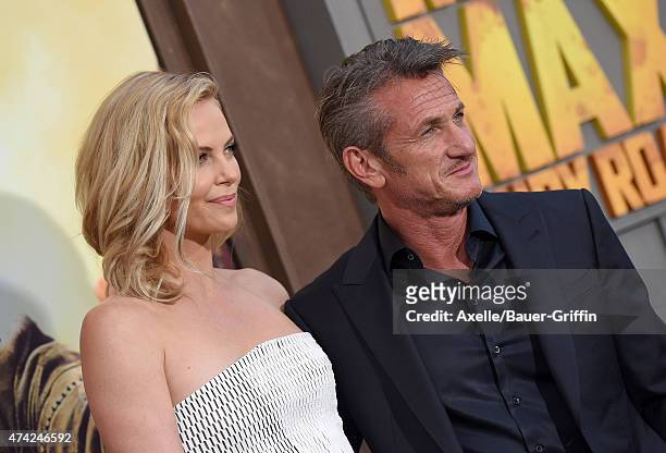 Actors Charlize Theron and Sean Penn arrive at the Los Angeles premiere of 'Mad Max: Fury Road' at TCL Chinese Theatre IMAX on May 7, 2015 in...