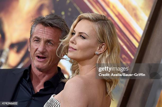 Actors Charlize Theron and Sean Penn arrive at the Los Angeles premiere of 'Mad Max: Fury Road' at TCL Chinese Theatre IMAX on May 7, 2015 in...