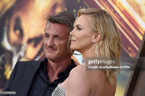 Actors Charlize Theron and Sean Penn arrive at the Los Angeles premiere of 'Mad Max: Fury Road' at TCL Chinese Theatre IMAX on May 7, 2015 in...