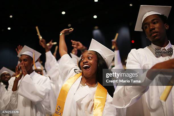 McDonogh Senior High School graduates celebrate at their commencement at the Ernest N. Morial Convention Center on May 14, 2015 in New Orleans,...