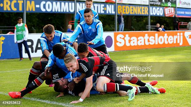 Daniel Simoes of Germany celebrates the first goal with his team mates during the international friendly match between U15 Netherlands and U15...