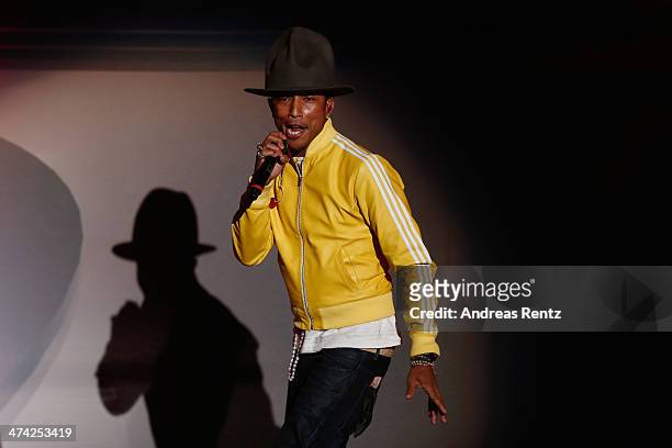 Singer Pharrell Williams performs on stage during the 'Wetten, dass..?' TV Show from Dusseldorf at the ISS Dome on February 22, 2014 in Duesseldorf,...