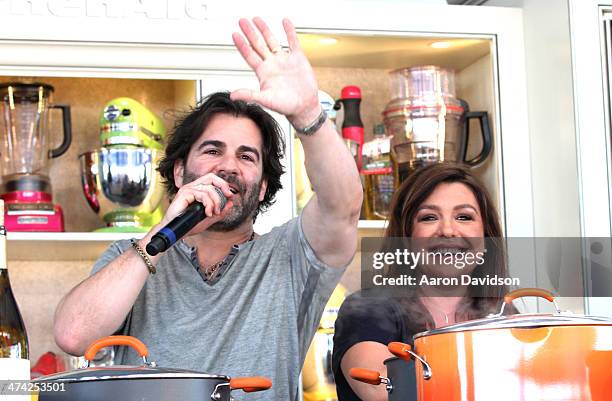 Rachael Ray and husband John Cusimano attends KitchenAid® Culinary Demonstrations during the Food Network South Beach Wine & Food Festival at Grand...