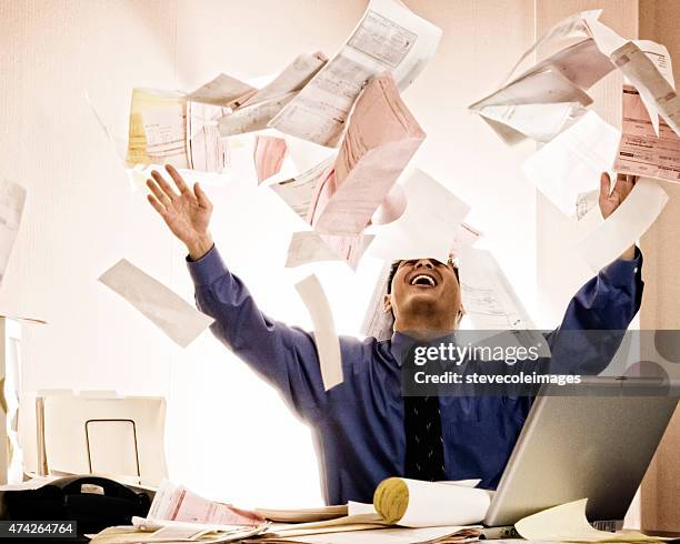 businessman tossing documents. - paper flying stock pictures, royalty-free photos & images