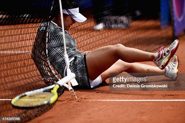 Kurumi Nara of Japan falls over during her match against Roberta Vinci of Italy during Day six of the Nuernberger Versicherungscup 2015 on May 21,...