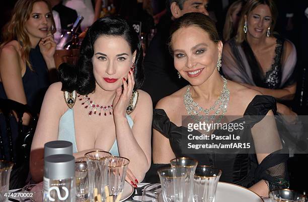 Model Dita Von Teese and Actress Ornella Muti attend amfAR's 22nd Cinema Against AIDS Gala, Presented By Bold Films And Harry Winston at Hotel du...