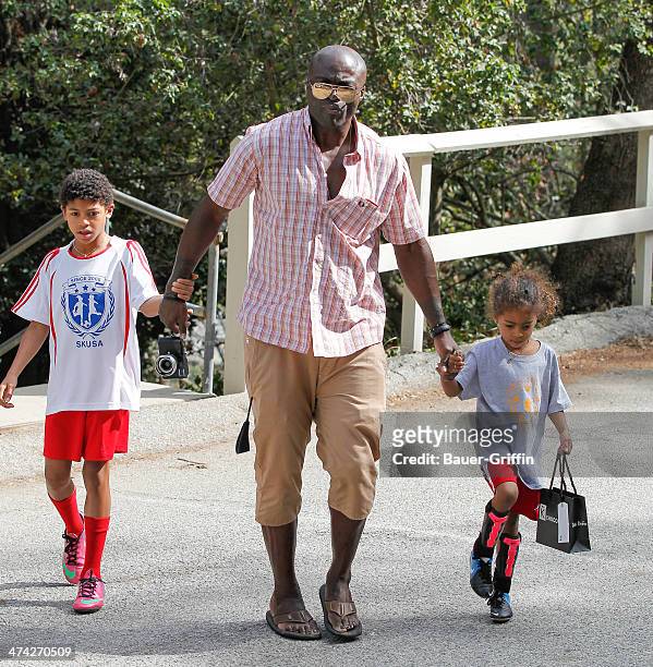 Seal with Lou Samuel and Henry Samuel are seen on February 22, 2014 in Los Angeles, California.