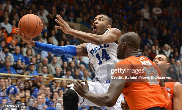 Duke's Rasheed Sulaimon goes in to score in the second half as Syracuse's Baye Moussa Keita defends at Cameron Indoor Stadium in Durham, N.C.,...