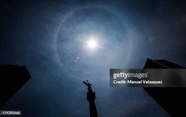 Prominent sun halo is seen around the sun at Angel de la Independencia on May 21 in Mexico City, Mexico. The halo is one type of optical phenomenon,...