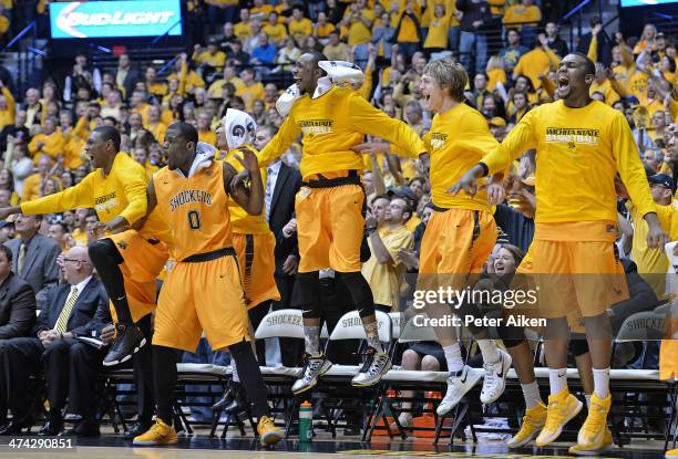 The Wichita State Shockers bench celebrates after defeating the Drake Bulldogs to win the Missouri Valley Conference on February 22, 2014 at Charles...