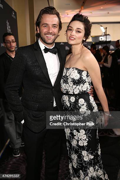 Host Darren McMullen and actress Crystal Reed attend the 16th Costume Designers Guild Awards with presenting sponsor Lacoste at The Beverly Hilton...