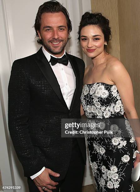 Host Darren McMullen and actress Crystal Reed attend the 16th Costume Designers Guild Awards with presenting sponsor Lacoste at The Beverly Hilton...