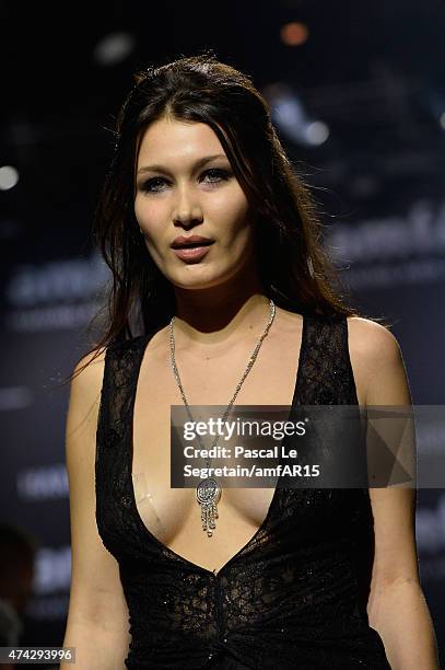 Model Bella Hadid walks during the fashion show runway during amfAR's 22nd Cinema Against AIDS Gala, Presented By Bold Films And Harry Winston at...