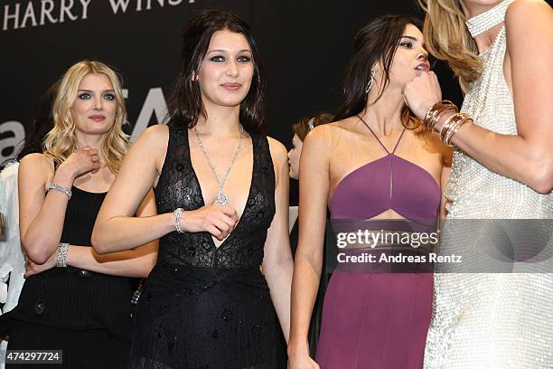 Models Lily Donaldson, Bella Hadid and Kendall Jenner onstage during amfAR's 22nd Cinema Against AIDS Gala, Presented By Bold Films And Harry Winston...