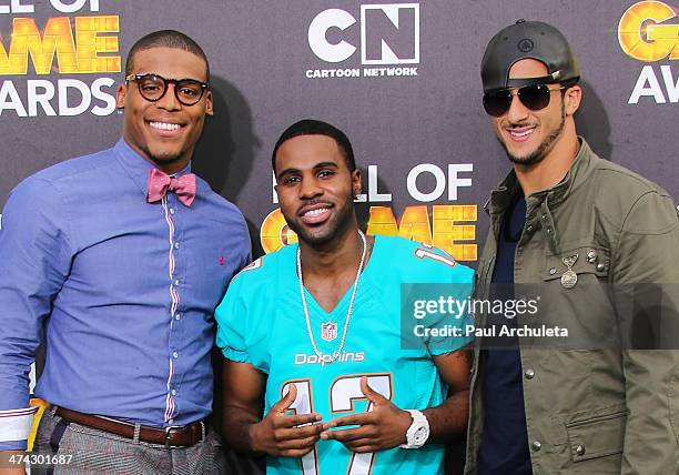 Cam Newton, Jason Derulo and Colin Kaepernick attend the Cartoon Network's Hall Of Game Awards at Barker Hangar on February 15, 2014 in Santa Monica,...