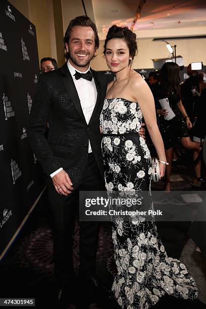 Host Darren McMullen and actress Crystal Reed attend the 16th Costume Designers Guild Awards with presenting sponsor Lacoste at The Beverly Hilton...