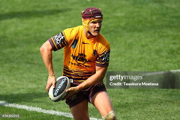 Todd Lowrie of the Brisbane Broncos looks to pass during the NRL trial match between the Brisbane Broncos and the New Zealand Warriors at Forsyth...