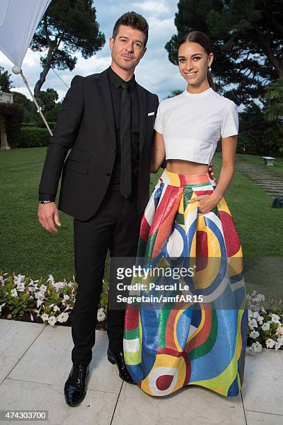Musician Robin Thicke and April Love Geary attends amfAR's 22nd Cinema Against AIDS Gala, Presented By Bold Films And Harry Winston at Hotel du...