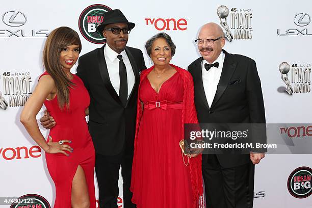 Actress Elise Neal, TV show host Arsenio Hall, TV personality Cathy Hughes and Tom Joyner attend the 45th NAACP Image Awards presented by TV One at...