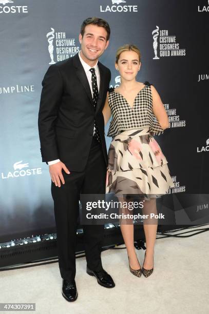 Actors James Wolk and Kiernan Shipka attend the 16th Costume Designers Guild Awards with presenting sponsor Lacoste at The Beverly Hilton Hotel on...