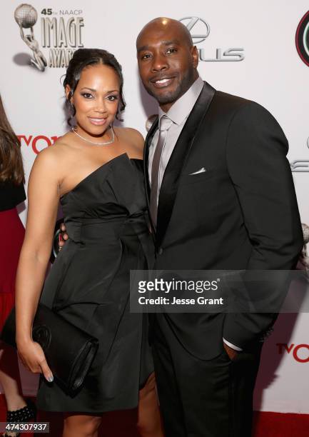 Actor Morris Chestnut and Pam Byse attend the 45th NAACP Image Awards presented by TV One at Pasadena Civic Auditorium on February 22, 2014 in...