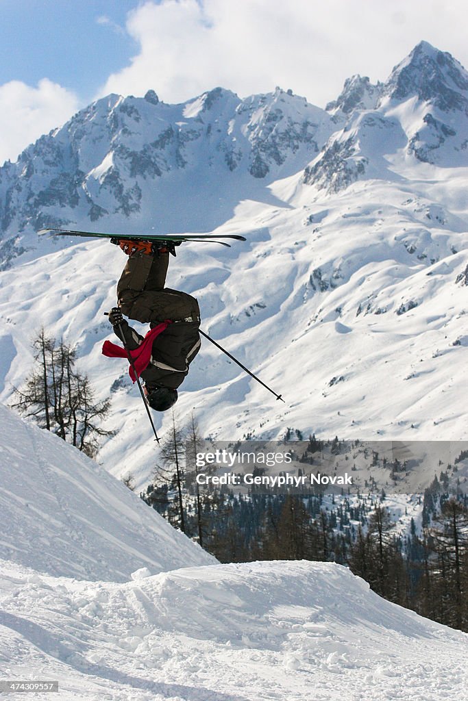 Upside down skier jumping