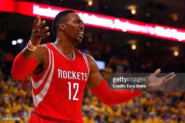 Dwight Howard of the Houston Rockets reacts after a play in the first quarter against the Golden State Warriors during game two of the Western...
