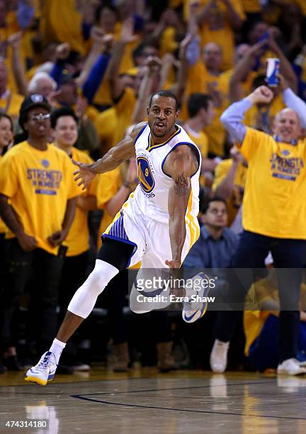 Andre Iguodala of the Golden State Warriors reacts after a dunk in the second quarter against the Houston Rockets during game two of the Western...
