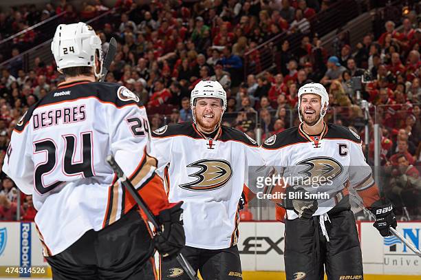 Cam Fowler and Ryan Getzlaf of the Anaheim Ducks react after Simon Despres scored against the Chicago Blackhawks in the second period in Game Three...