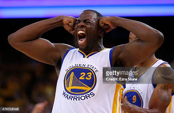 Draymond Green of the Golden State Warriors reacts after a play in the third quarter against the Houston Rockets during game two of the Western...