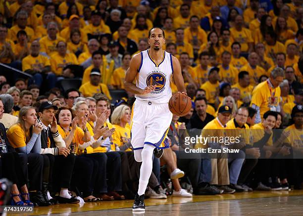 Shaun Livingston of the Golden State Warriors brings the ball up court in the second half against the Houston Rockets during game two of the Western...