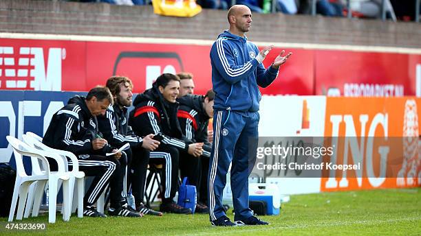 Head coach Andre Schubert of Germany applauds his team during the international friendly match between U15 Netherlands and U15 Germany at the DETO...