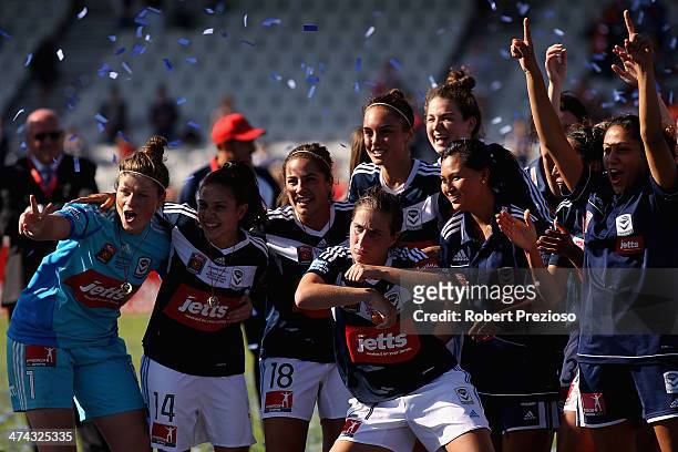 Melbourne Victory players celebrate after winning the W-League Grand Final match between the Melbourne Victory and the Brisbane Roar at Lakeside...