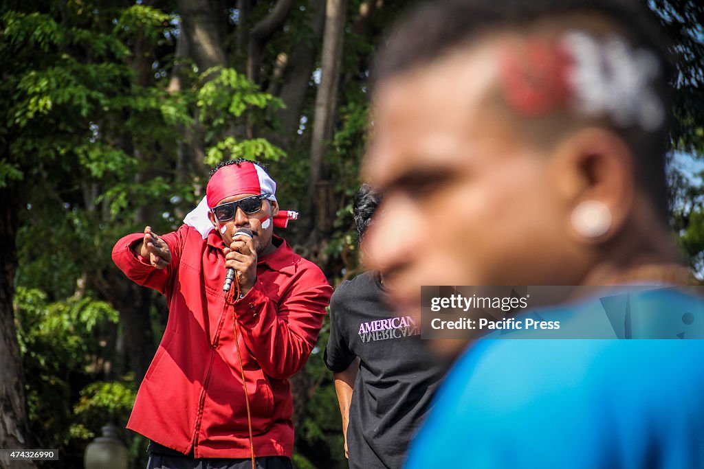A protester speaks to a crowd of students during an anti-...
