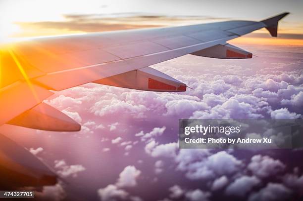 up in the sky - flugzeugflügel stock-fotos und bilder