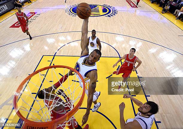 Andre Iguodala of the Golden State Warriors goes up for a dunk in the second quarter against Dwight Howard of the Houston Rockets during game two of...