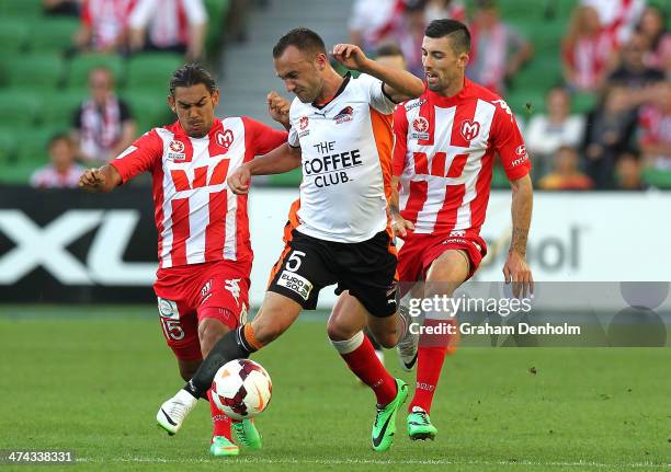 Ivan Franjic of the Roar is surrounded by the Heart defence during the round 20 A-League match between Melbourne Heart and Brisbane Roar at AAMI Park...